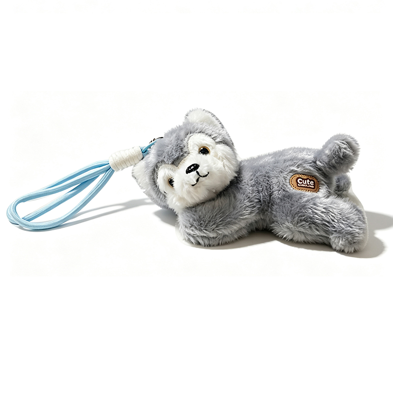 CIONDOLO DA BORSA / PORTACHIAVI SOFFICE A FORMA DI CAGNOLINO SDRAIATO CON ZAMPE MAGNETICHE - AX260080D191
