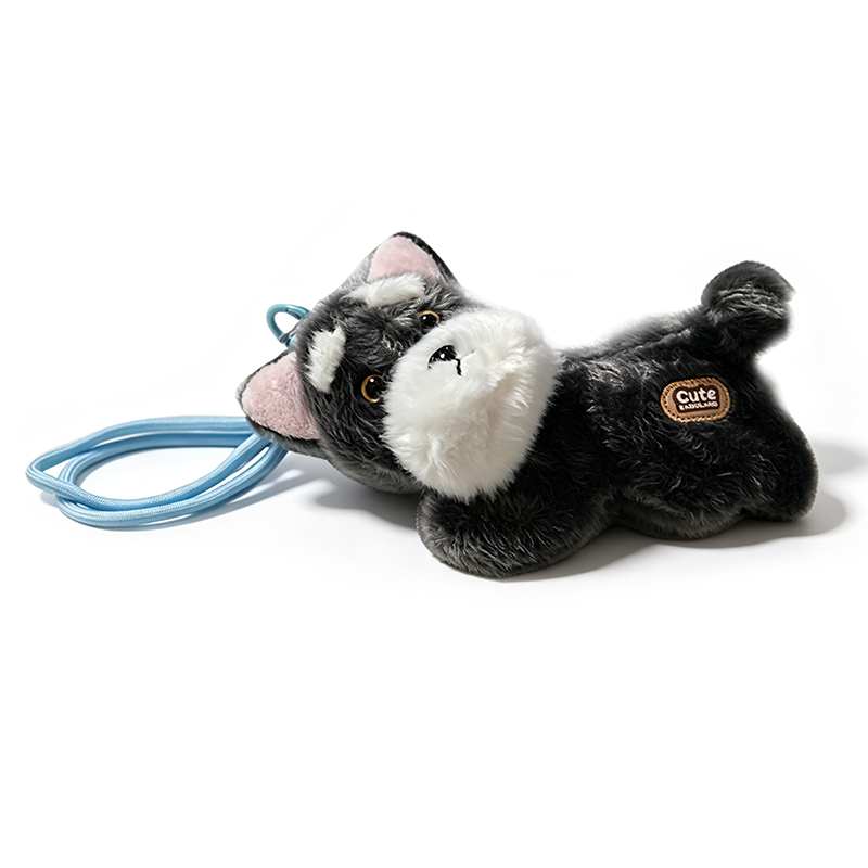 CIONDOLO DA BORSA / PORTACHIAVI SOFFICE A FORMA DI CAGNOLINO SDRAIATO CON ZAMPE MAGNETICHE - AX260080D191