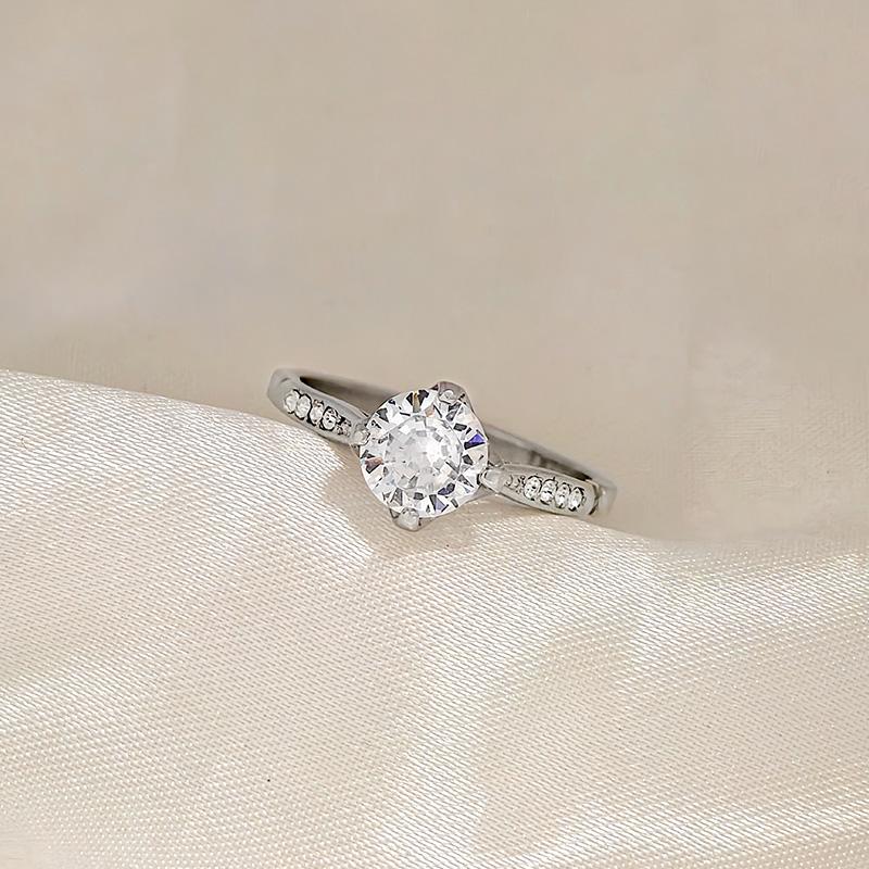 ANELLO DI FIDANZAMENTO REGOLABILE CON ZIRCONE - AGS2464B496 ANELLO DI FIDANZAMENTO REGOLABILE CON ZIRCONE - AGS2464B496