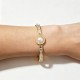 BRACCIALE RIGIDO A MOLLA CON PERLA TONDA CENTRALE E STRASS - DH25100B481
