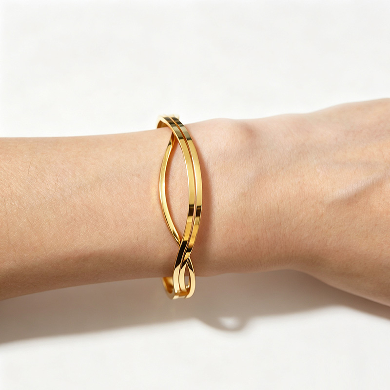BRACCIALE RIGIDO LINEE INCROCIATE - DH2580B479
