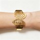 BRACCIALE RIGIDO A MOLLA CON FOGLIE TRAFORATE - DH2588B478