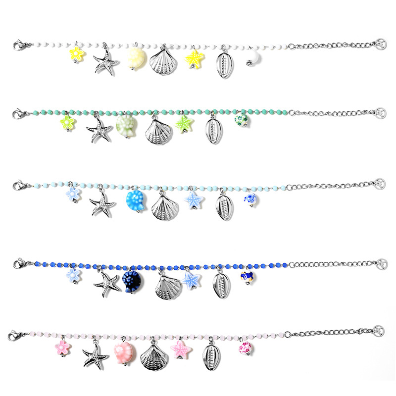 BRACCIALE DI PERLINE COLORATE E CHARMS MARINI - FFJ25784C618