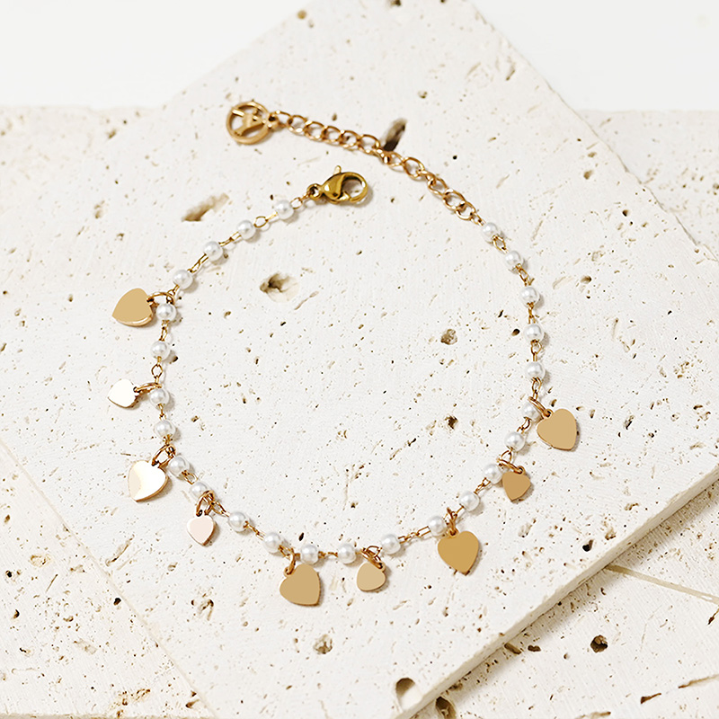 BRACCIALE PERLINE E CHARMS CUORI - JN2161704C25 BRACCIALE PERLINE E CHARMS CUORI - JN2161704C25