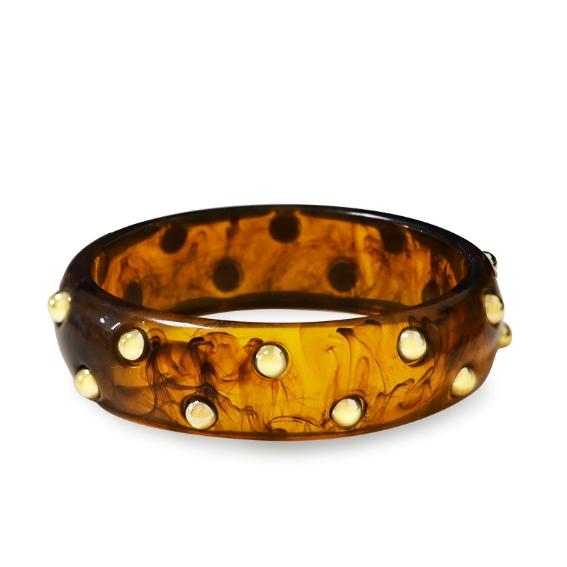 BRACCIALE RIGIDO IN RESINA CON BORCHIE DORATE - KW2548C553