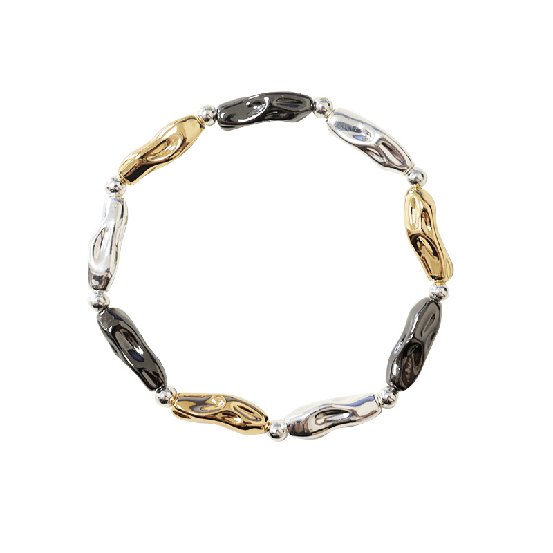 BRACCIALE ELASTICO CON PERLINE METALLICHE - SW2448B688 BRACCIALE ELASTICO CON PERLINE METALLICHE - SW2448B688