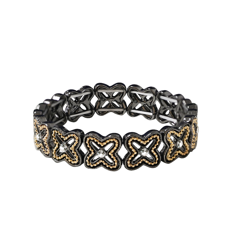 BRACCIALE ELASTICO A QUADRIFOGLI TRAFORATI CON STRASS - SW2488B657 BRACCIALE ELASTICO A QUADRIFOGLI TRAFORATI CON STRASS - SW2488B657