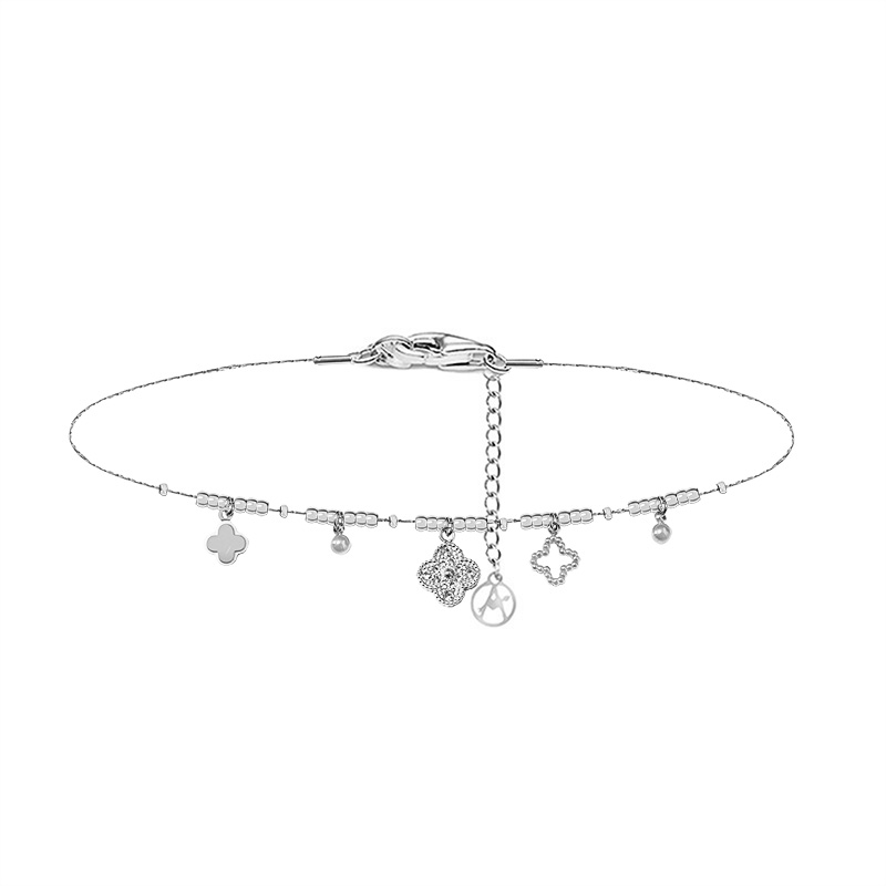 BRACCIALE QUADRIFOGLIO CON PICCOLE SFERE E CHARMS - YC2588B138