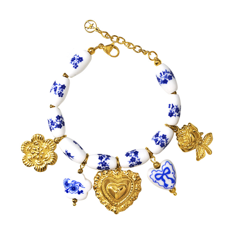 BRACCIALE CON PERLINE IN PORCELLANA BIANCA E BLU E CHARMS - YNK2694C738