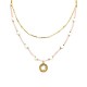 COLLANA A DOPPIO FILO CON PERLINE STELLE E PENDENTE - NK21124136F51 COLLANA A DOPPIO FILO CON PERLINE STELLE E PENDENTE - NK21124136F51