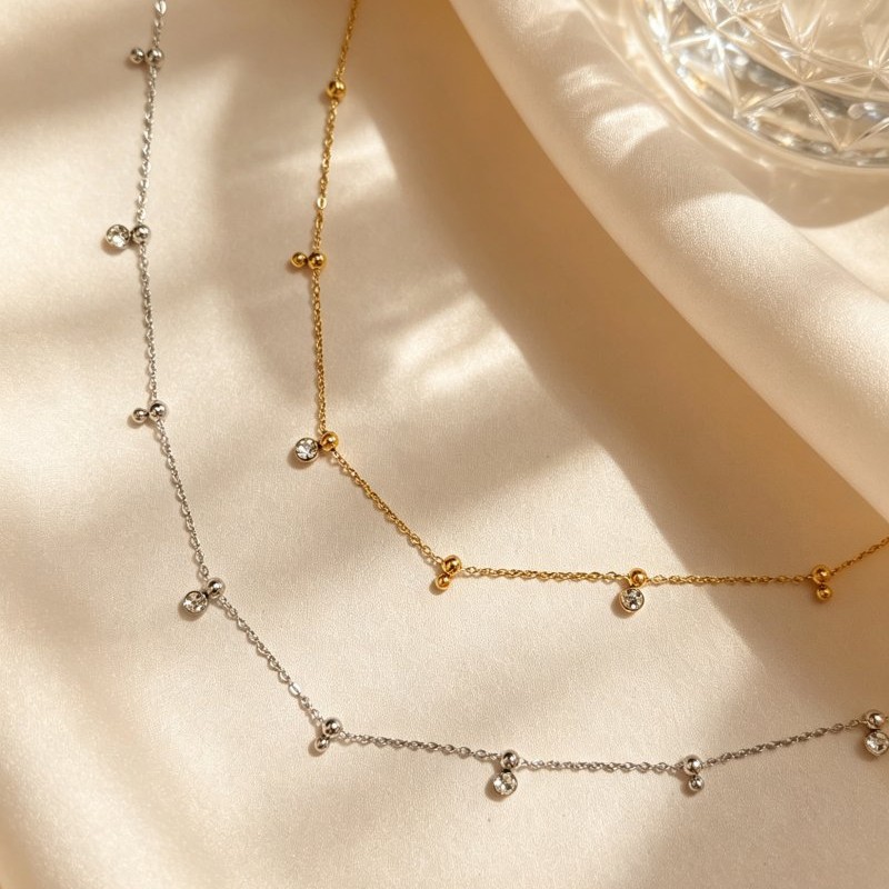 COLLANA CON SFERE E PUNTI LUCE - YC2664C937
