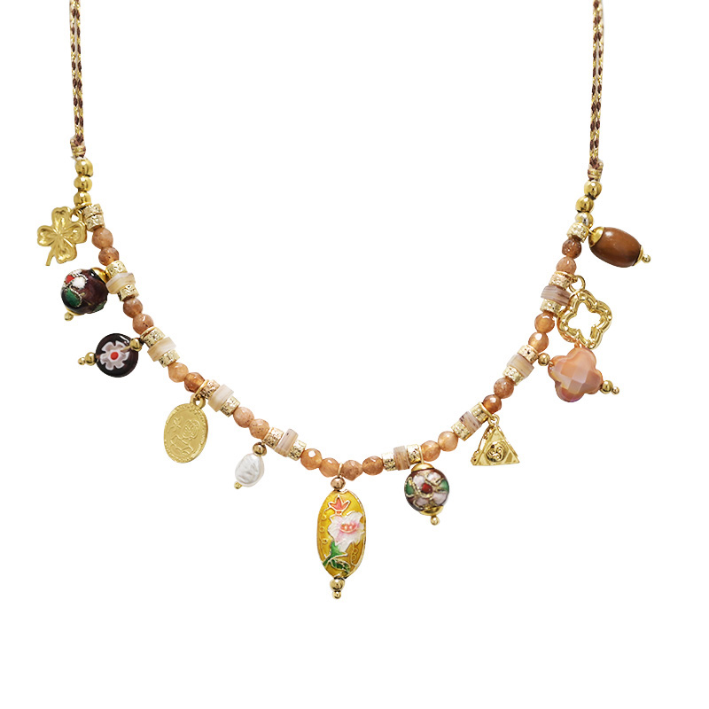 COLLANA FILO IN TESSUTO CON PERLINE E CHARMS - YNK24176B831 COLLANA FILO IN TESSUTO CON PERLINE E CHARMS - YNK24176B831