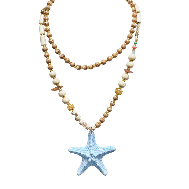 COLLANA LUNGA CON PERLINE IN PLASTICA E CIONDOLO STELLA MARINA - YNK25140C385