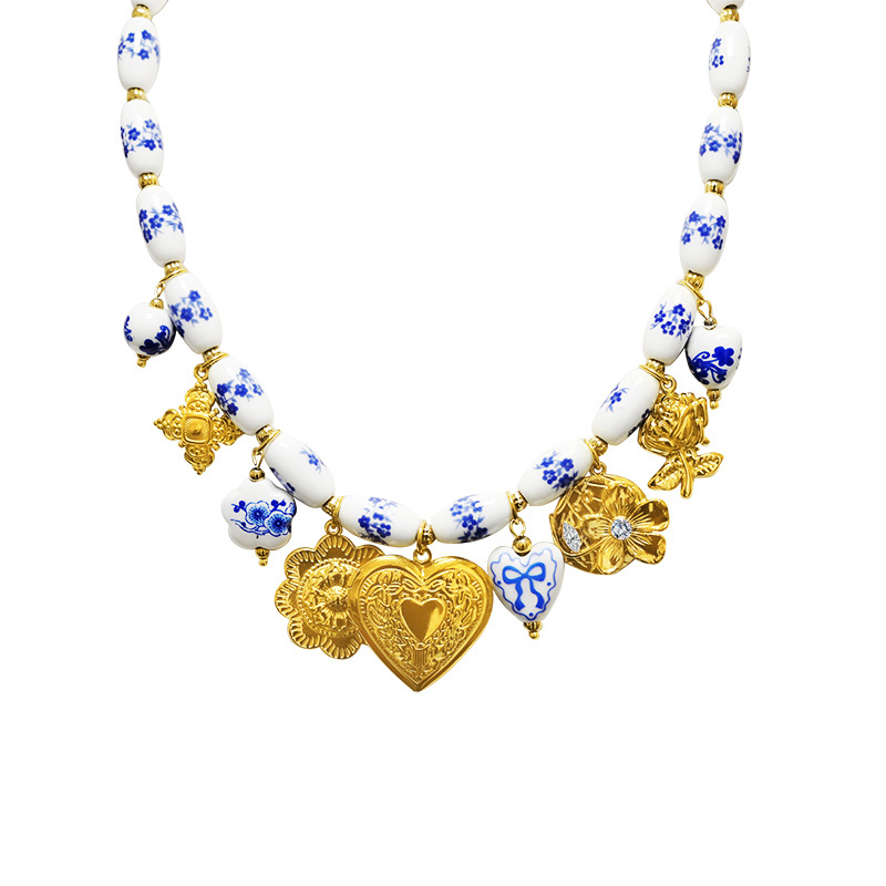 COLLANA CON PERLINE IN PORCELLANA BIANCA E BLU E CHARMS - YNK26190C737